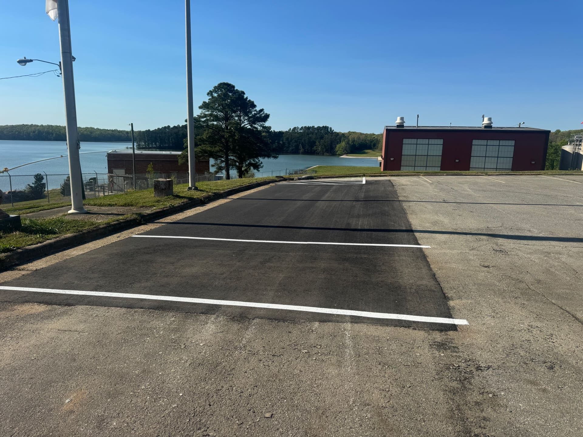 Water Treatment Plant: asphalt patching / pavement markings by HD Grading in Greensboro, NC